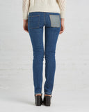 TOME TOME Upcycled Denim Skinny Jeans | reversed pocket detail view