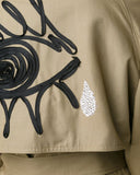 TOME Tailored Trench Coat with embroidered evil eye and Swarovksi crystal-embellished tear drop detail